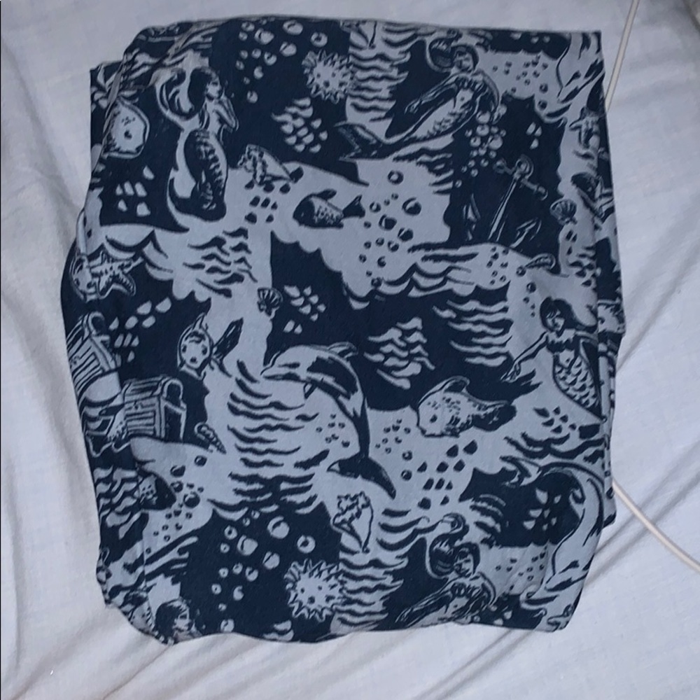 LULAROE leggings with mermaids and fish.